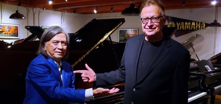 A poster for Rob Mullins & Bob Baker — Two Grand Pianos Concert event