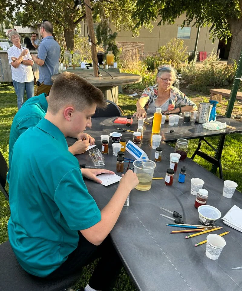 Photo of community interacting with the inks - Courtesy of Melody Epperson