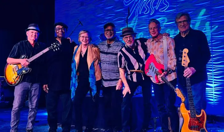 A poster for The Saints event