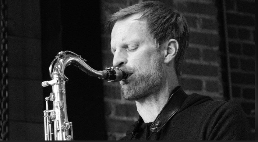 A poster for Tyler Farr Quartet  event