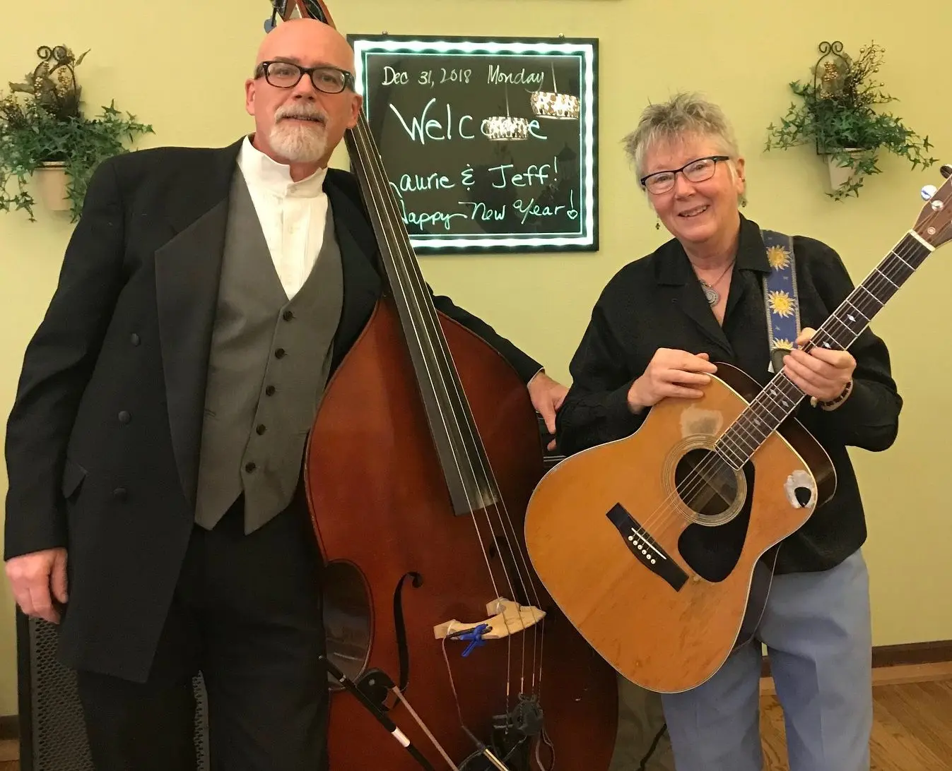 A poster for Laurie D & Jeff Fournier event