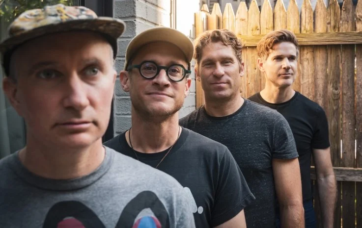 A poster for Kneebody event