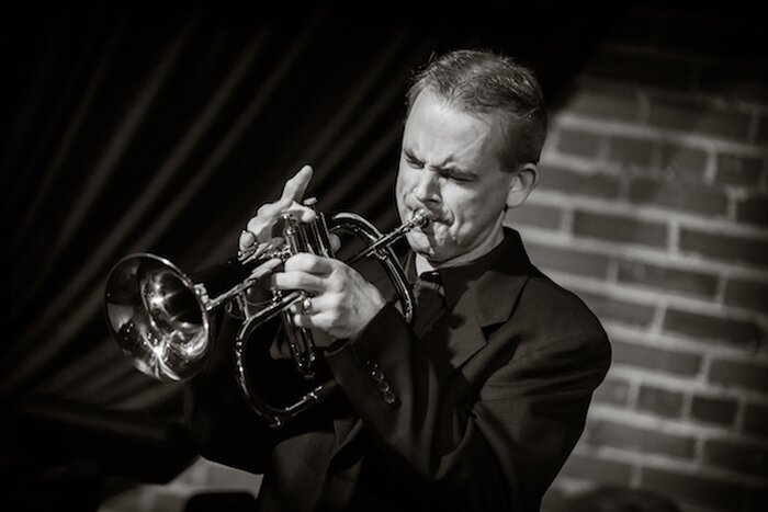 A poster for The Derek Banach Quintet event