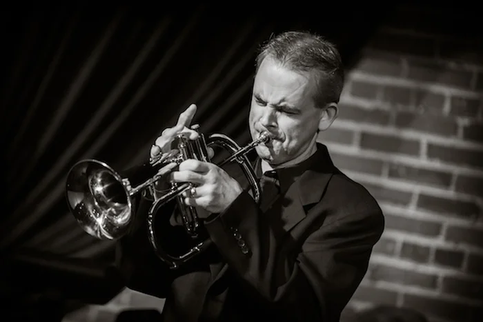 A poster for The Derek Banach Quintet event