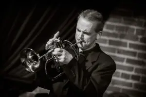 A poster for Derek Banach Quintet: A Modern Groove event