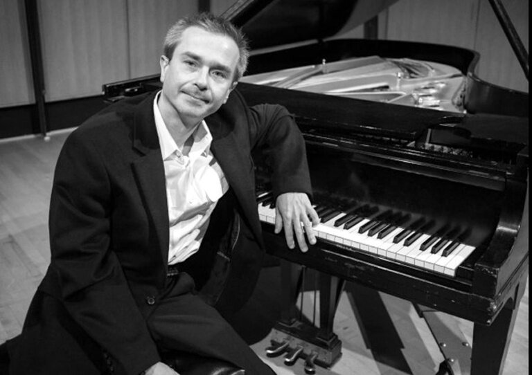 A poster for The Vlad Girshevich Trio event