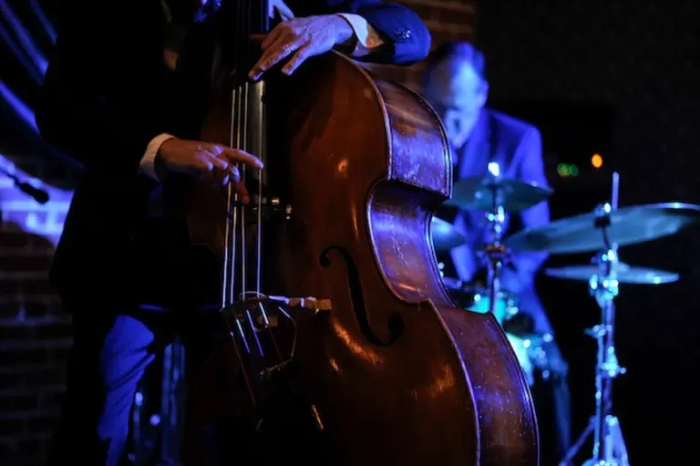 A poster for The Big Swing Trio event