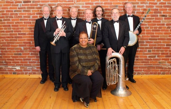 A poster for Queen City Jazz Band event