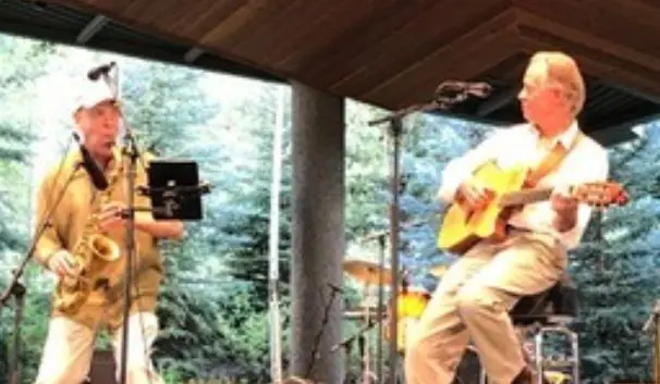 A poster for Justin Allison and Bob Rebholz event