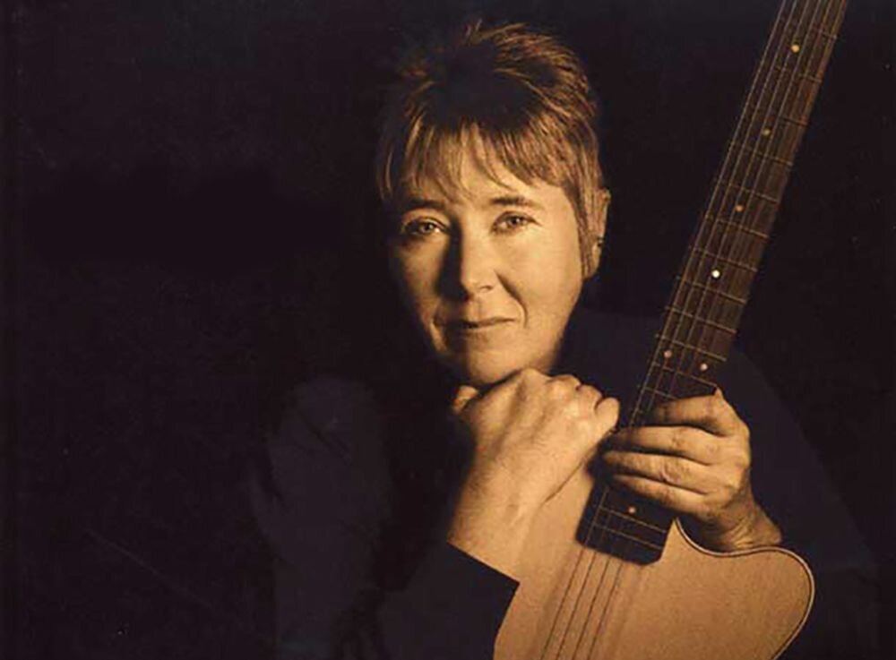 A poster for Laurie D Solo First Fridays event