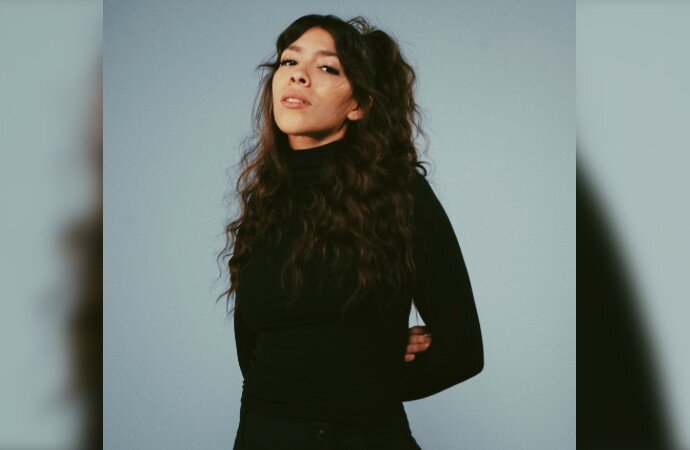 A poster for Dazzle Brunch with Halle Tomlinson event