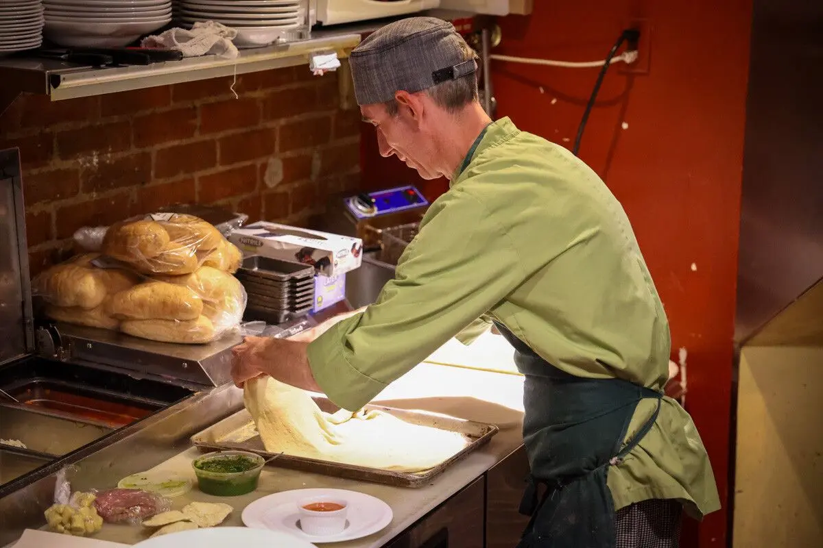 Chef Luke McCoy making pizza