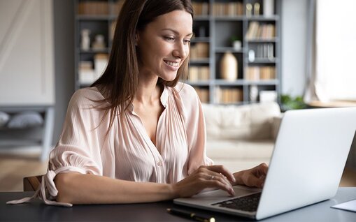 Creating a Brand Identity for Real Estate Agents - Image of woman on laptop