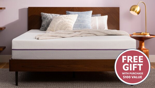 Alex Morgan laying on Molecule mattress