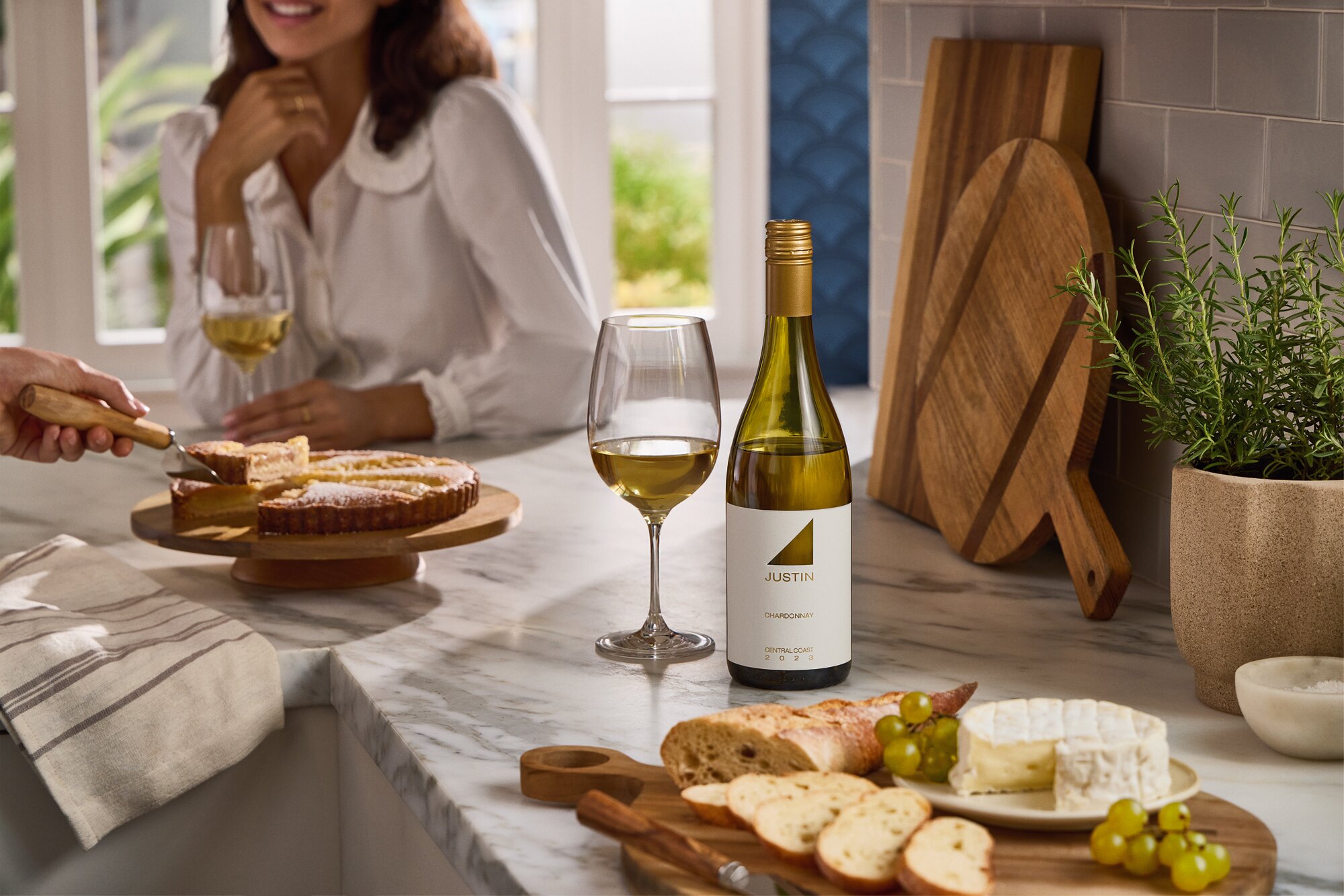 Plump, pink, poached lobster with green peas and golden sauce. 