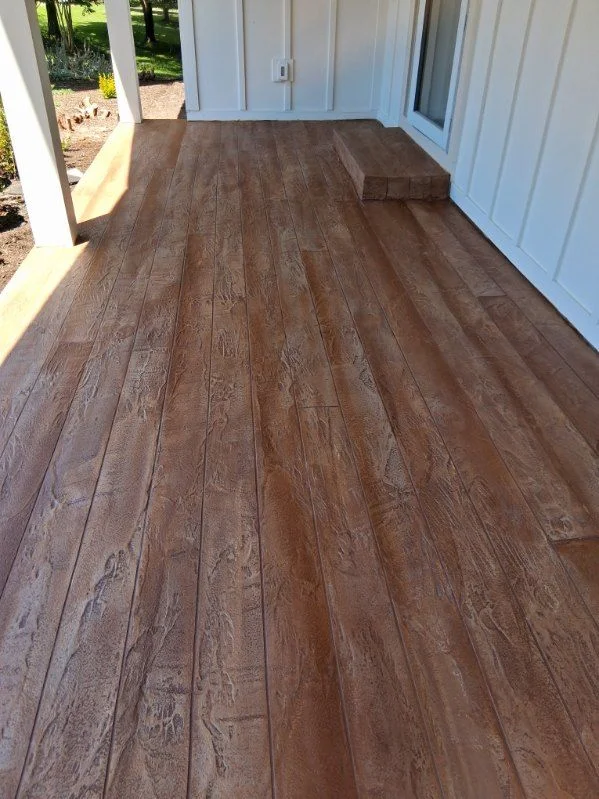 Warm wood-plank textured concrete porch overlay