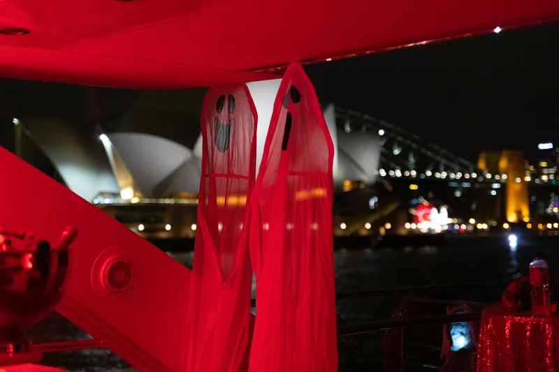 Halloween decorations on a yacht overlooking Sydney Opera House