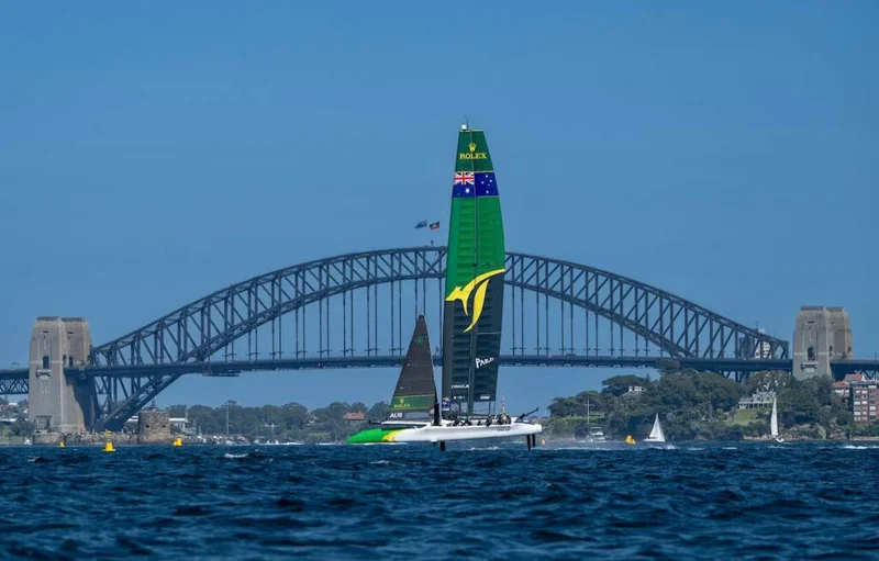 SailGP racing yacht with Sydney Harbour Bridge
