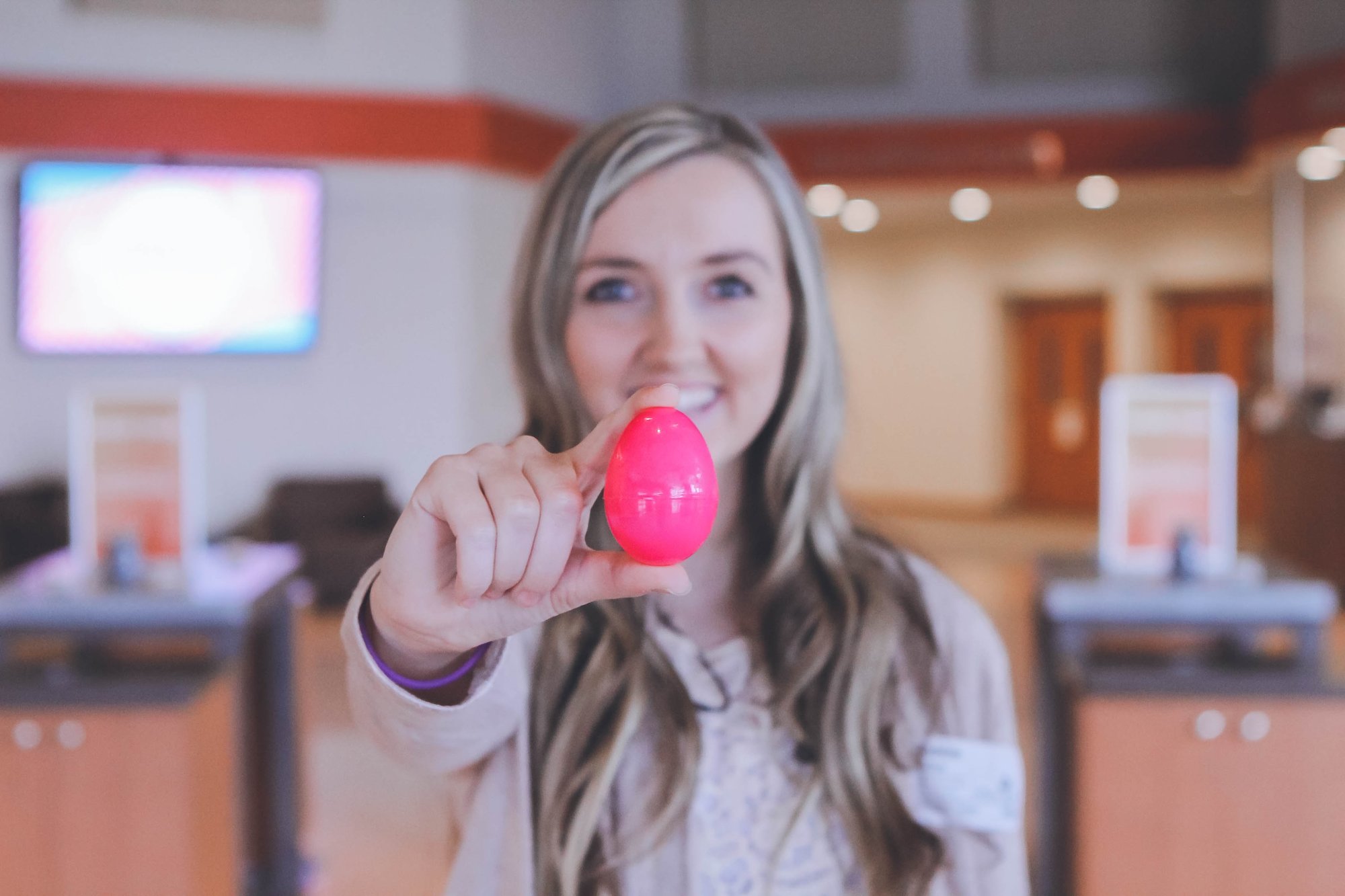 Girl holding plastic egg