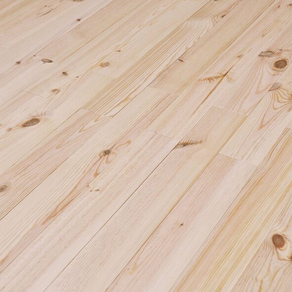Close-up of maritime pine floorboards showing natural grain, knots and tongue and groove joints