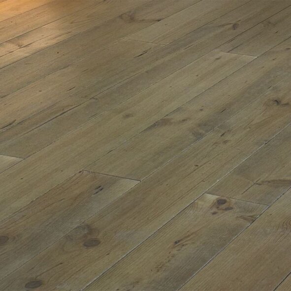 Close-up of oiled maritime pine floorboard showing enhanced grain and natural finish