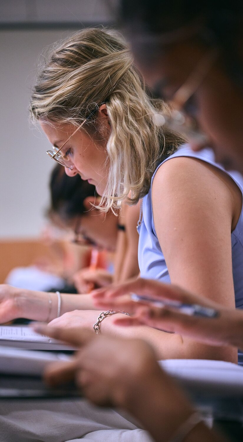 IMAT preparation course in classroom with a Testbusters IMAT Medschool tutor and students