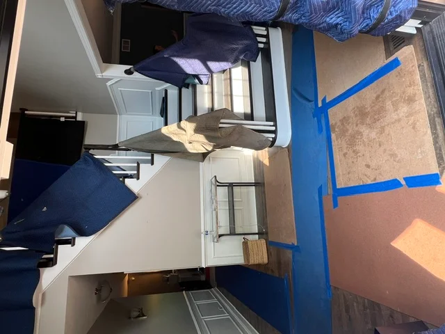 Home interior prepared with floor protection for moving day