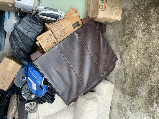 Furniture and boxes prepared for removal from storage