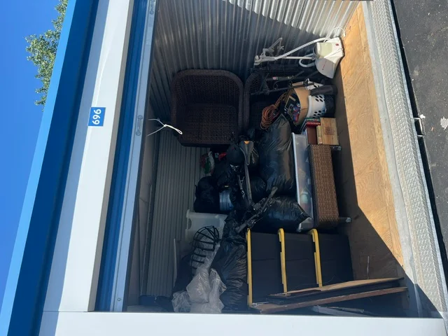 Storage unit being cleared during junk removal
