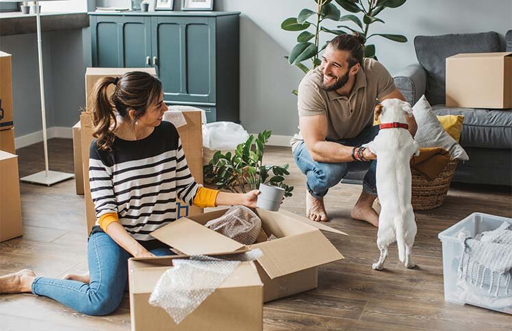 A family packing to move out of their home.