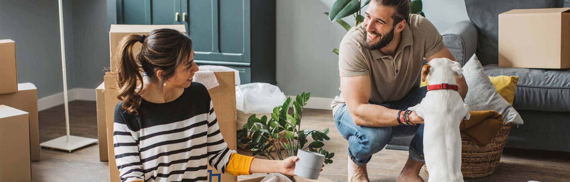 A family packing to move out of their home.