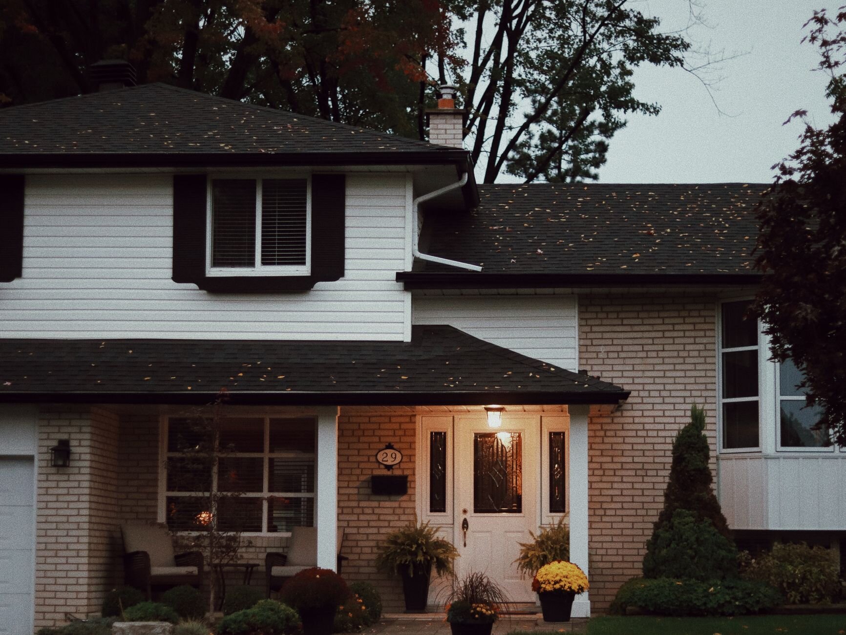 Front of house with door lamp turned on