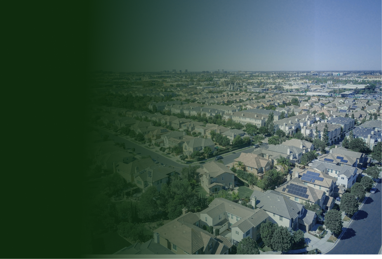 A housing estate of single-family homes seen from a bird's-eye view.