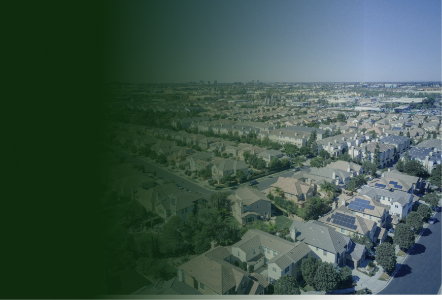 A housing estate of single-family homes seen from a bird's-eye view.