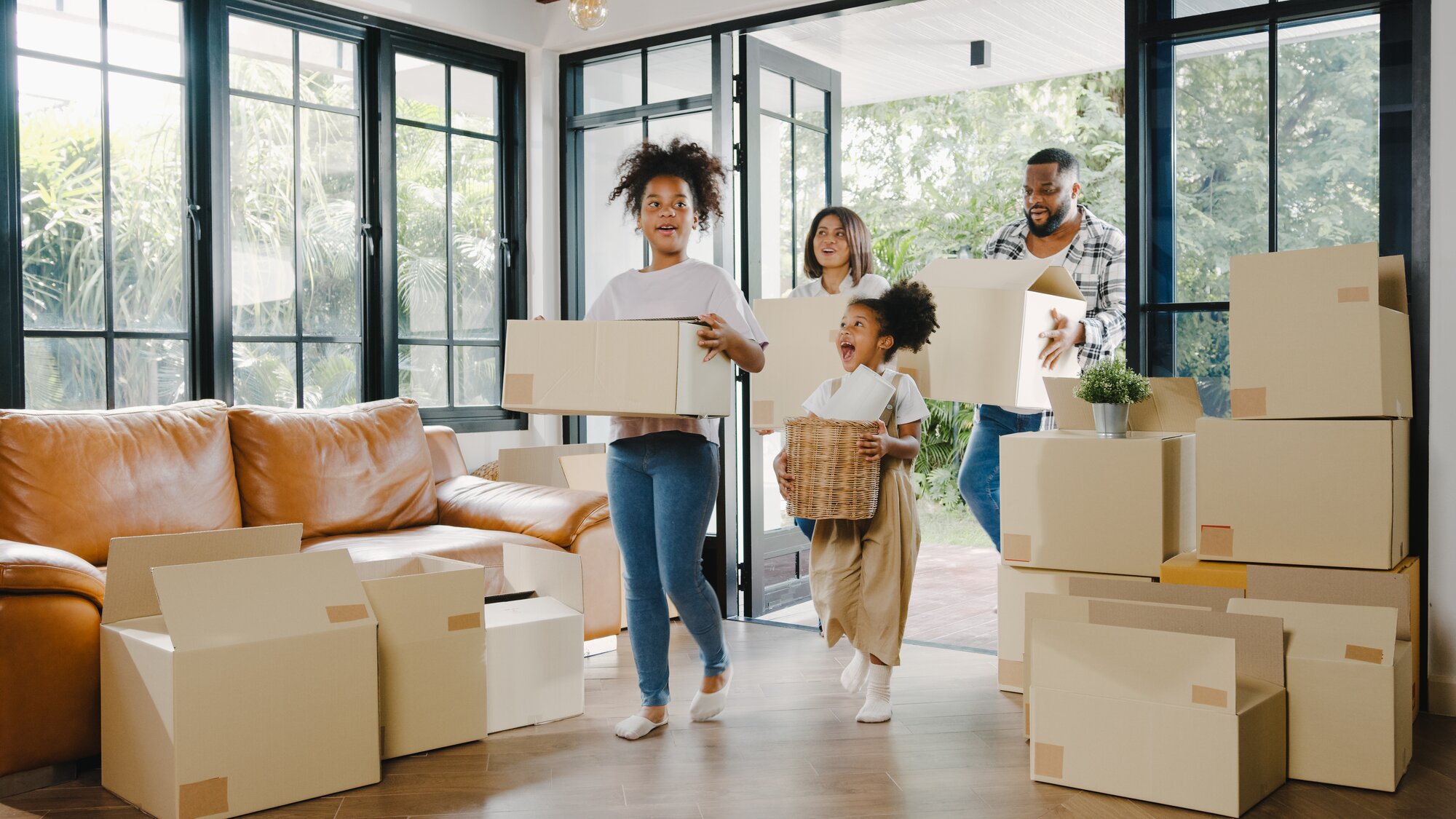 A family packing to move out of their home.