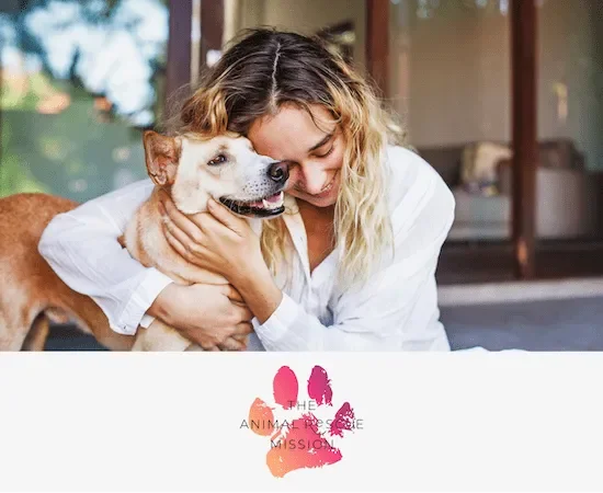 Image of a lady hugging her dog