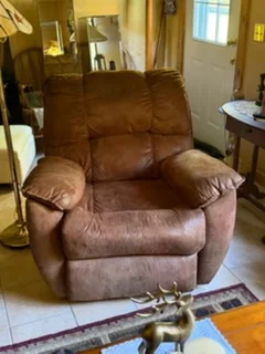 Brown upholstered recliner