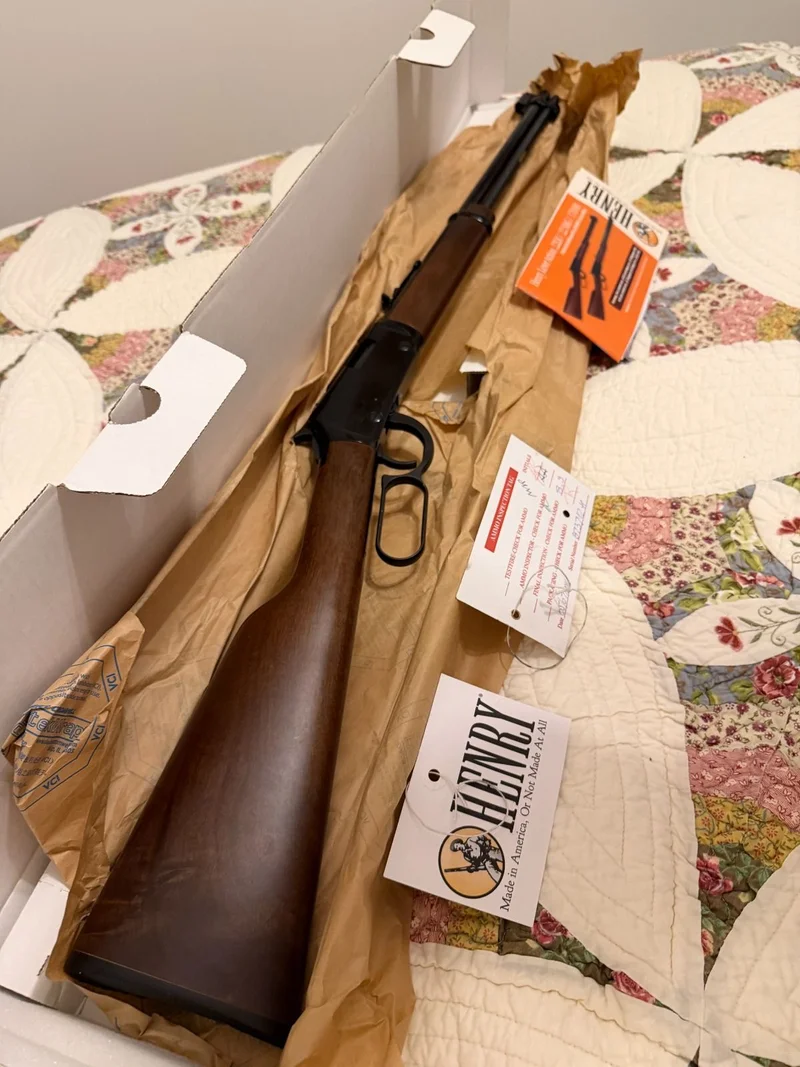 Henry Lever Action rifle in its shipping box