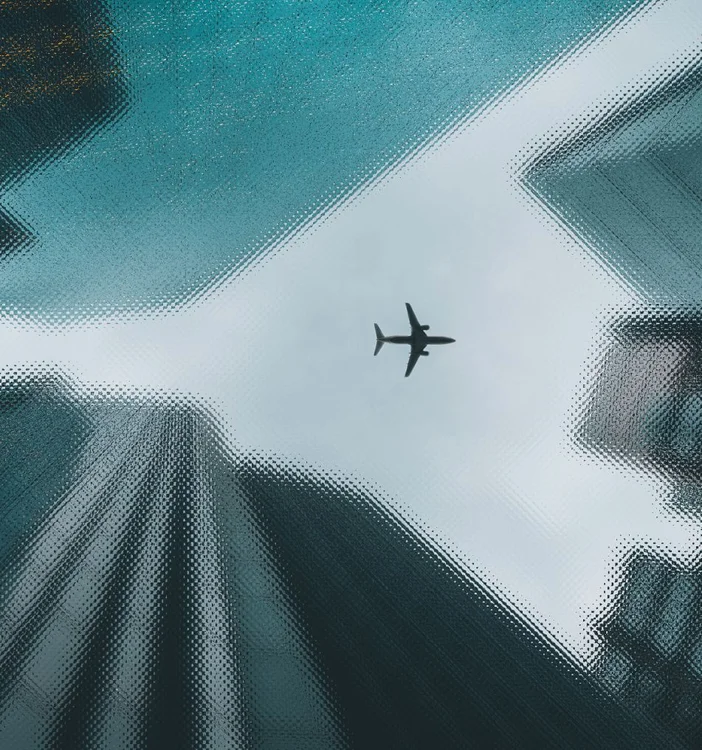 Wing of a plane, through plane's window