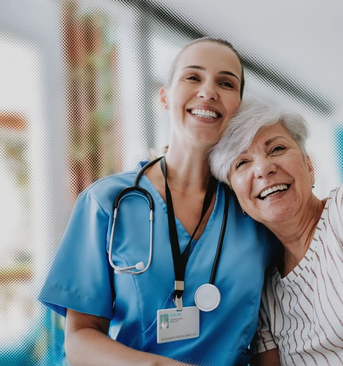 Woman nurse with an elderly patient
