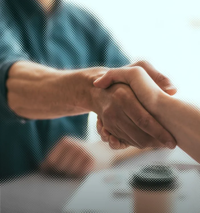 Two people shaking hands