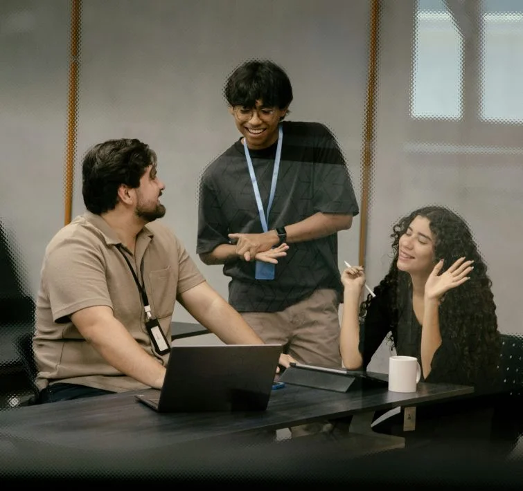 image of people analysing a screen