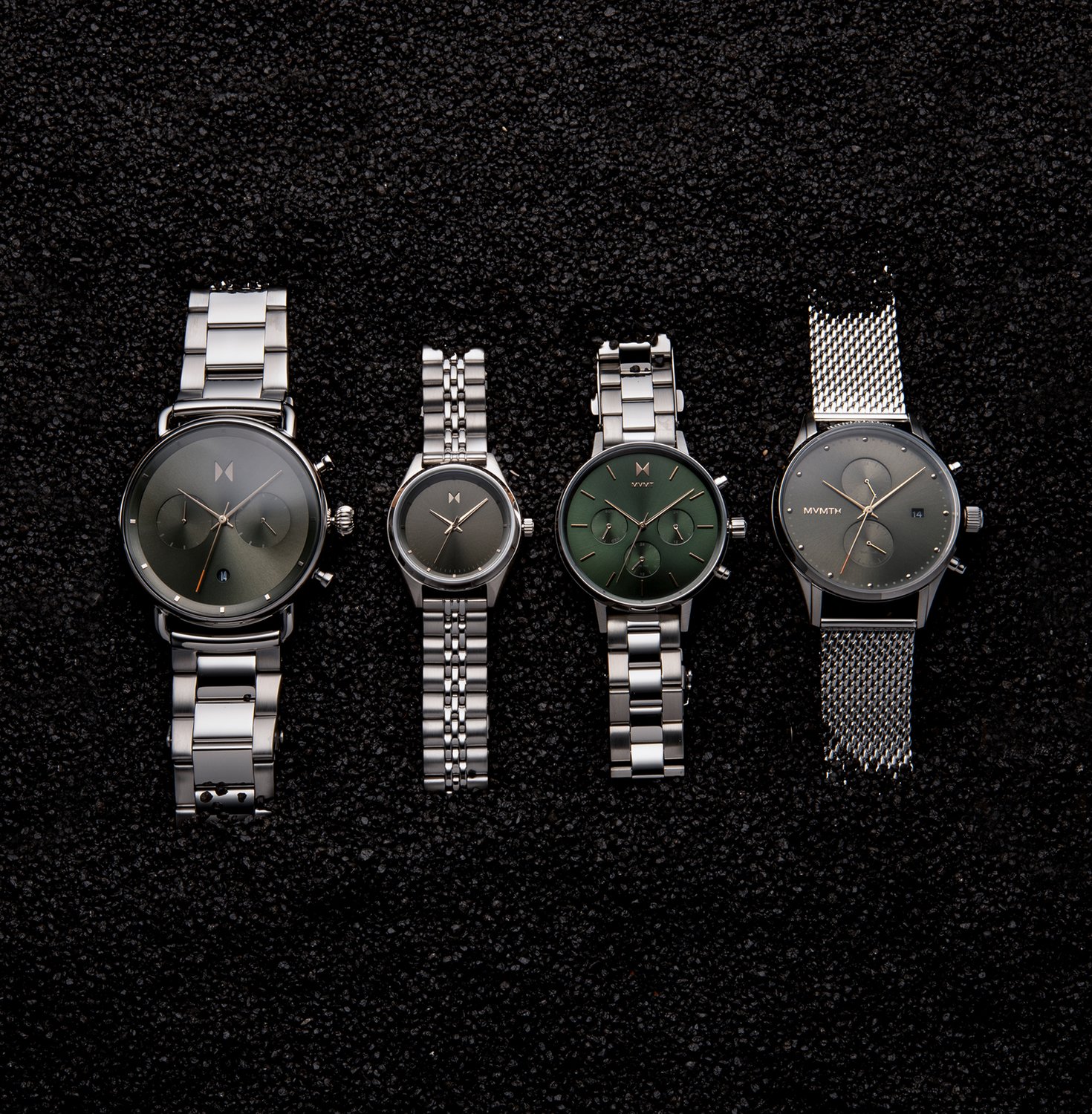 Gold & Black round sunglasses on green leaf background