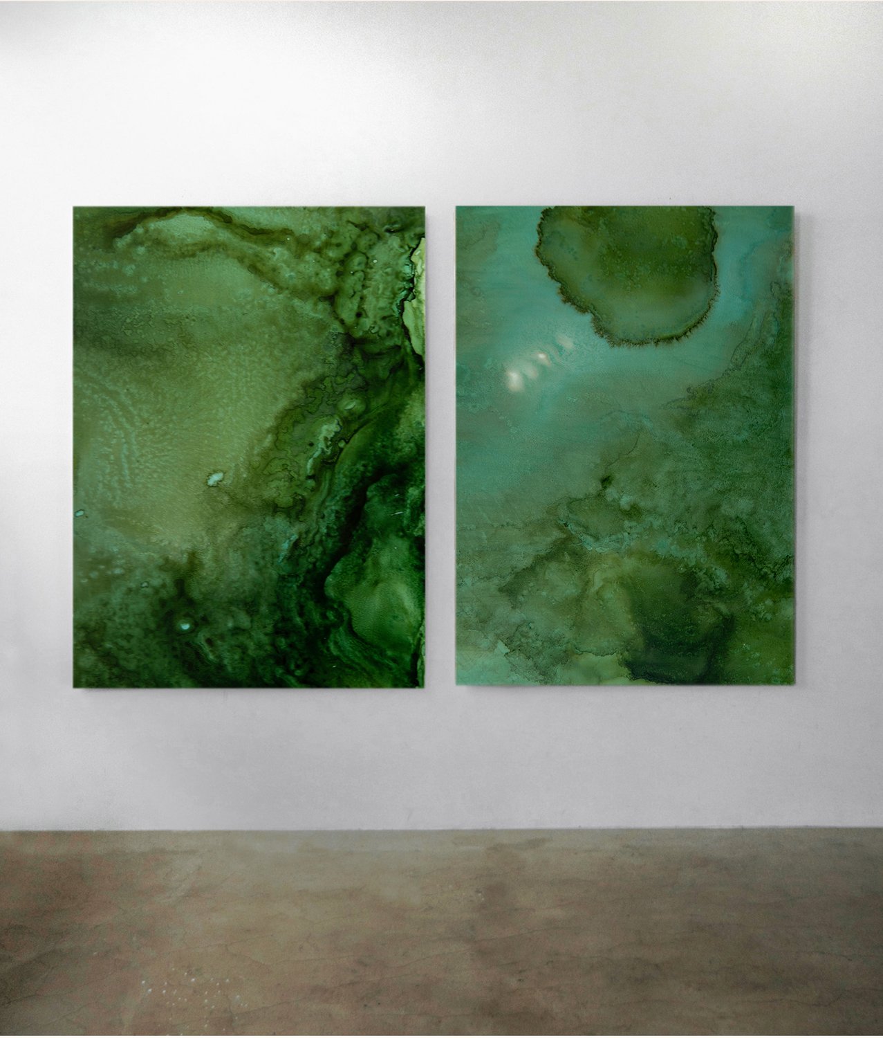 Kim Rose's 2 artworks in green hanging up on wall