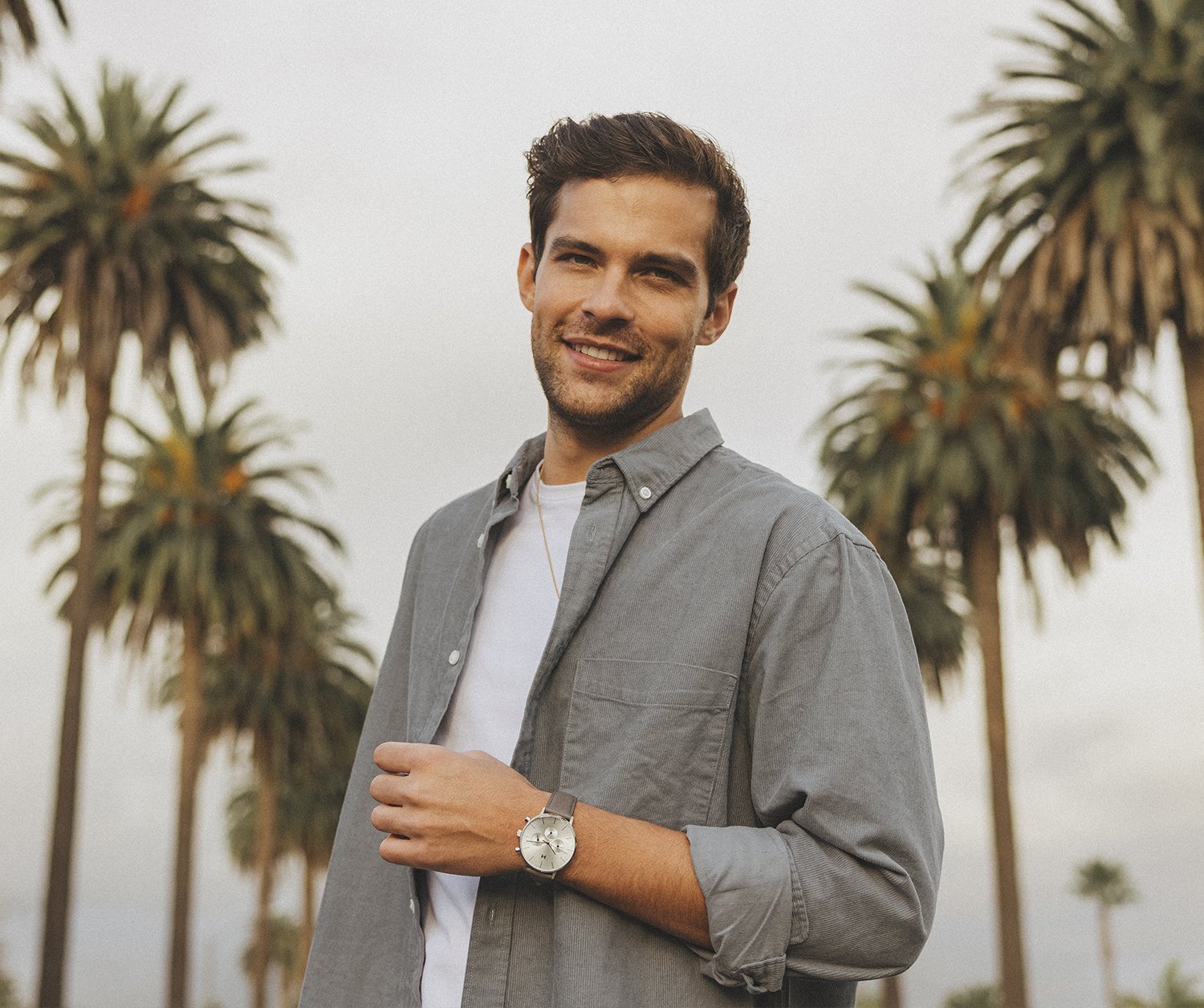 Male model wearing Men's MVMT watch