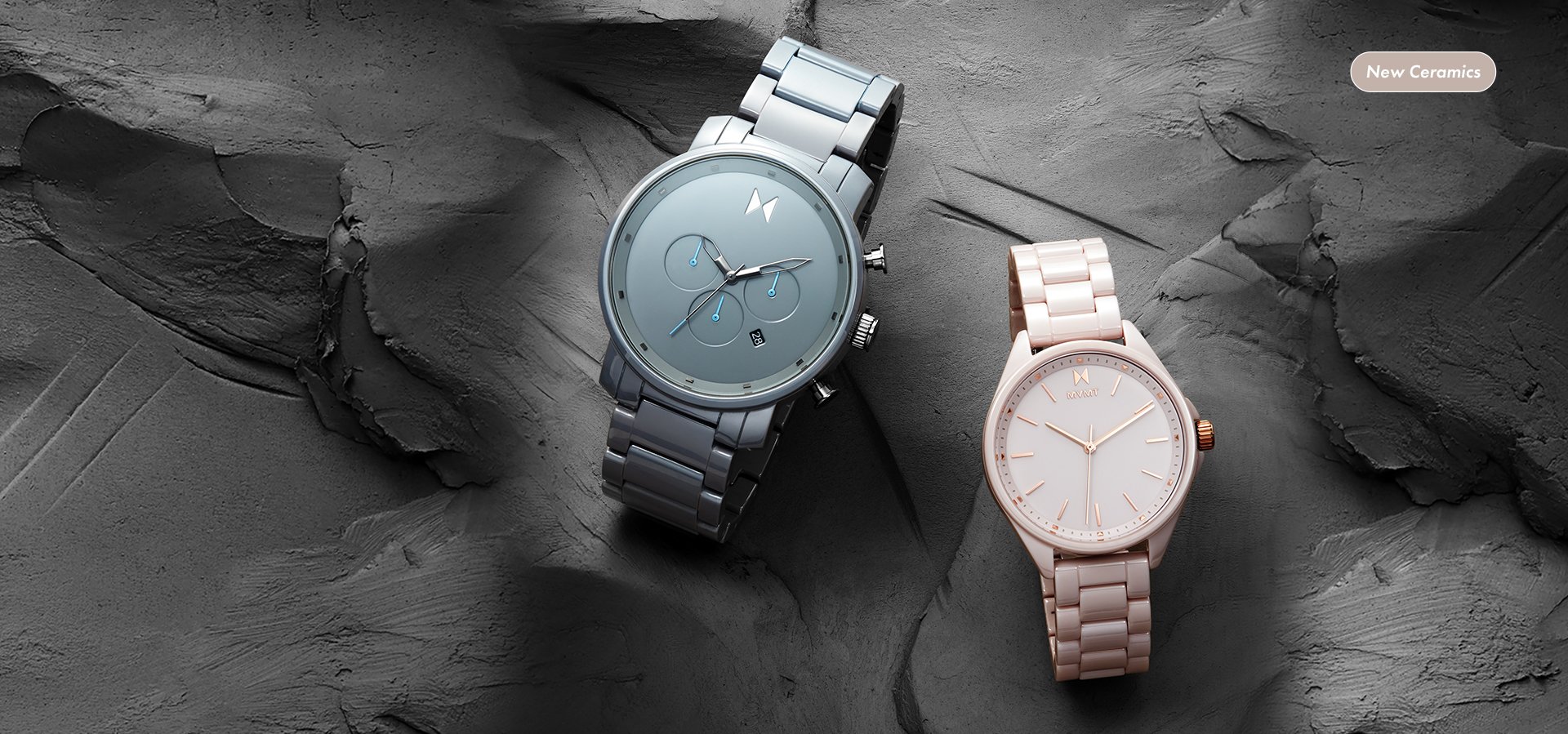mens and womens MVMT ceramic watches on stones
