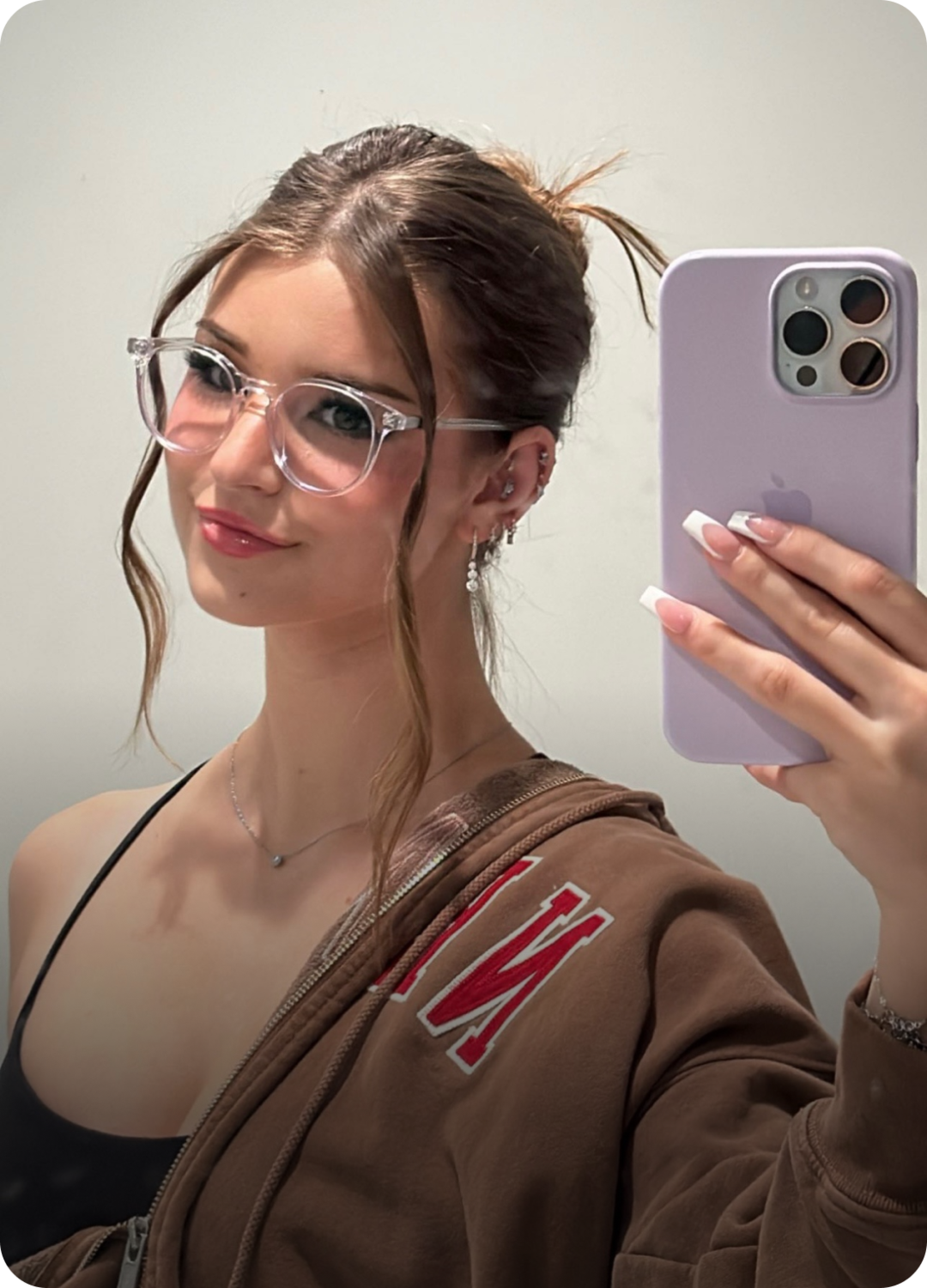 Brooke Monk wearing blue light glasses