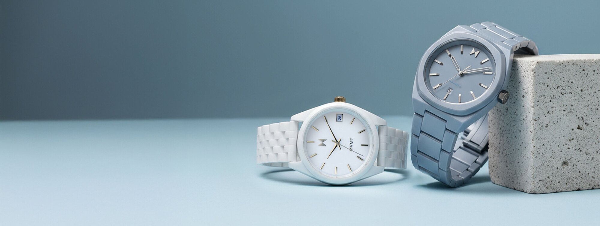 MVMT 3 watches - black watch watch underwater, white watch on wrist, black watch on hiker