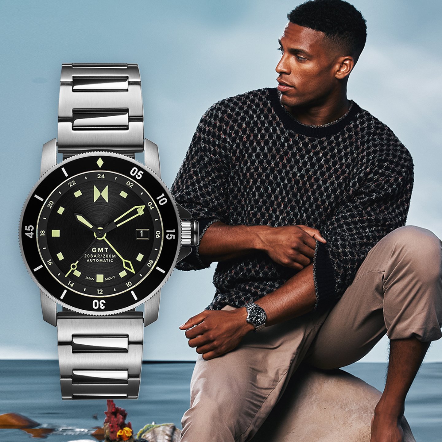 MVMT cali diver silver and black watch on model