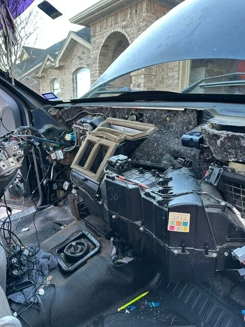 Disassembled automotive dashboard during restoration